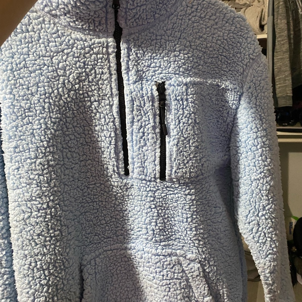 blue furry coat